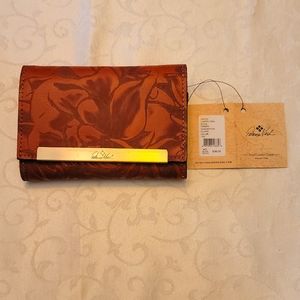 New with tags. Patricia Nash Laser Floral Wallet.